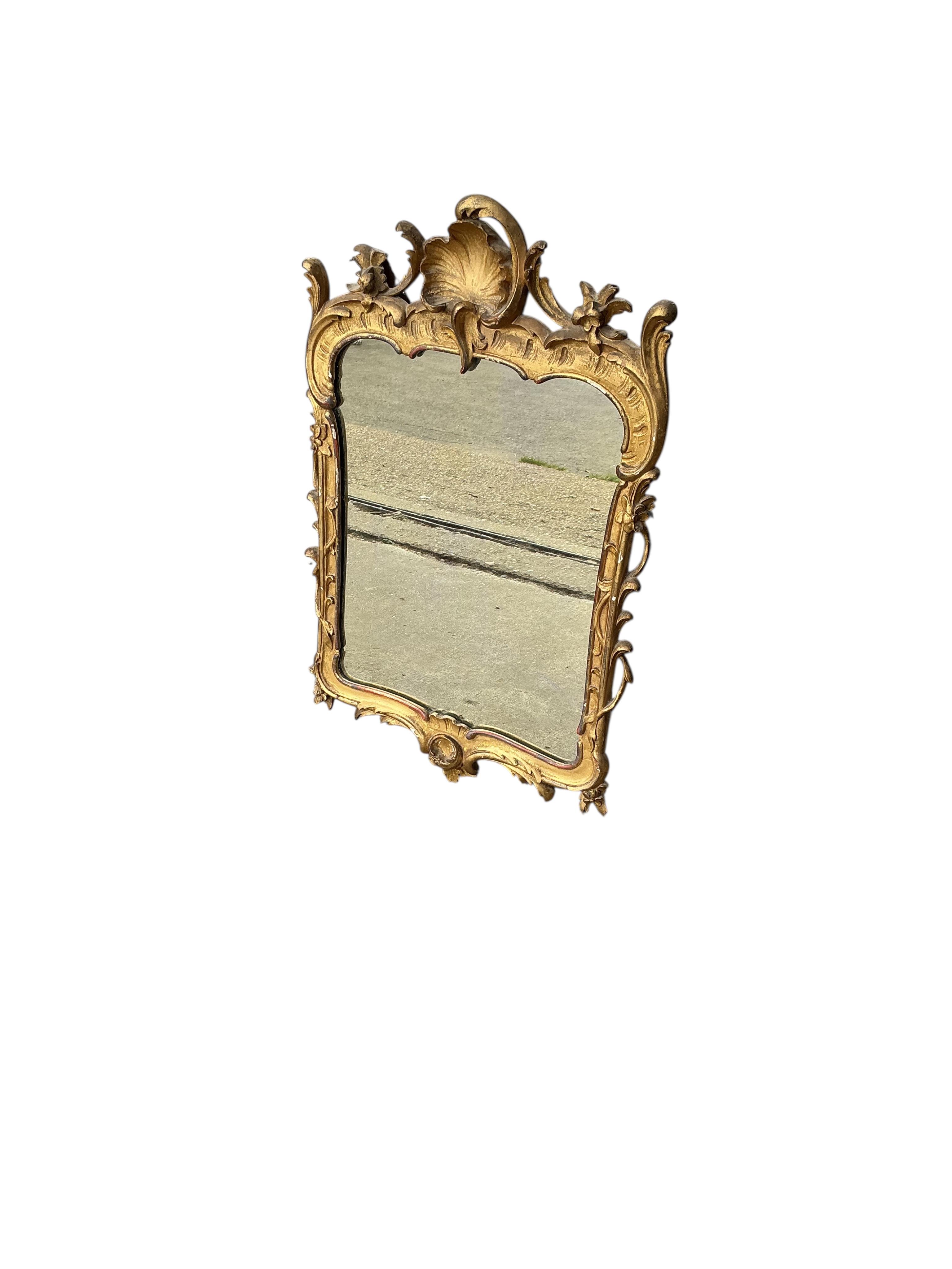 A Victorian giltwood and composition wall mirror, width 43cm, height 66cm